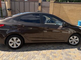 2014 Hyundai Solaris I Рестайлинг, коричневый, 849000 рублей, вид 2