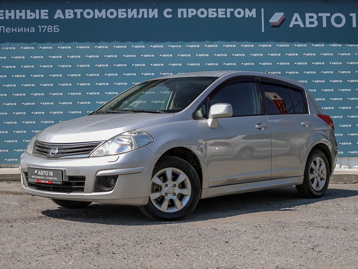 Открыть фотографии: Nissan Tiida I Рестайлинг