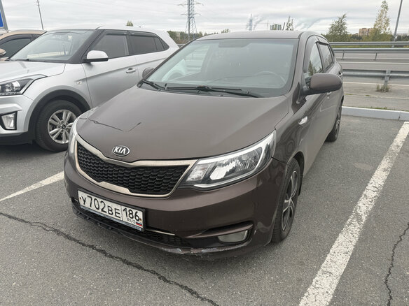 2015 Kia Rio III Рестайлинг, коричневый