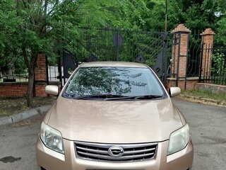 2010 Toyota Corolla Axio X (E140, E150) Рестайлинг, золотистый, 770000 рублей, вид 1