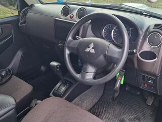 2010 Mitsubishi Pajero Mini II, серебристый, 1090000 рублей, вид 5