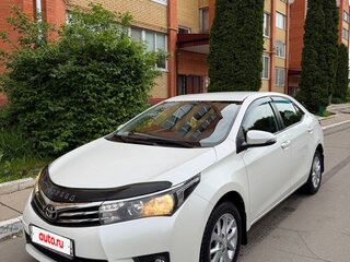 2014 Toyota Corolla XI (E160, E170, E180), белый, 1450000 рублей, вид 1