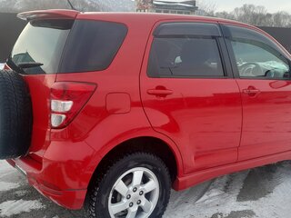 2006 Toyota Rush I, красный, 1050000 рублей, вид 2