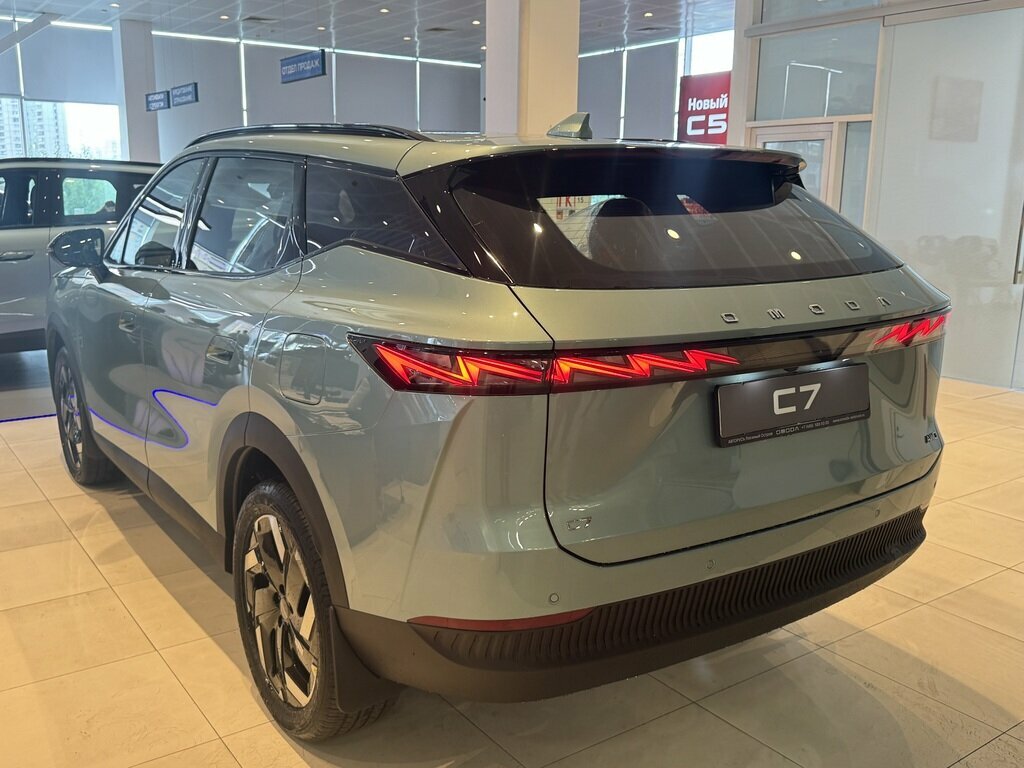 Открыть фотографии: Omoda C7