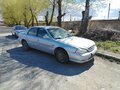 1999 Kia Clarus II, серебристый, 220000 рублей - вид 2
