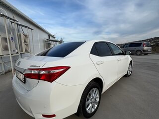 2014 Toyota Corolla XI (E160, E170, E180), белый, 1290000 рублей, вид 5