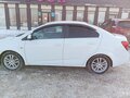 2012 Chevrolet Aveo II, белый, 630000 рублей - вид 7