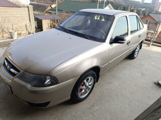 2013 Daewoo Nexia I Рестайлинг, бежевый, 600000 рублей, вид 1