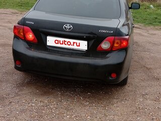 2009 Toyota Corolla X (E140, E150), чёрный, 650000 рублей, вид 4