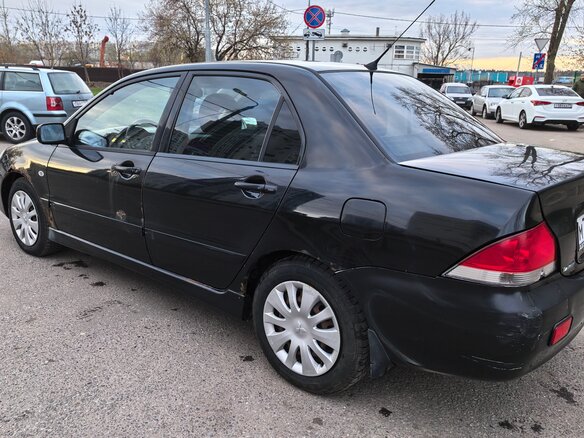 2007 Mitsubishi Lancer IX, чёрный, 350000 рублей - вид 4