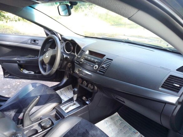 2008 Mitsubishi Lancer X, чёрный, 740000 рублей - вид 4