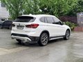 2021 BMW X1 Long 20Li sDrive II (F48) Рестайлинг, белый, 1859200 рублей - вид 3