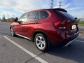 2012 BMW X1 20i I (E84), красный, 1690000 рублей - вид 5
