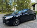 2010 Ford Focus II Рестайлинг, чёрный, 830000 рублей - вид 2