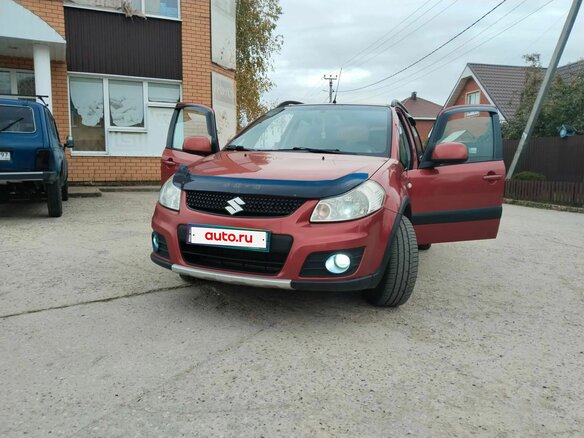 2010 Suzuki SX4 I (Classic) Рестайлинг, оранжевый, 760000 рублей - вид 3