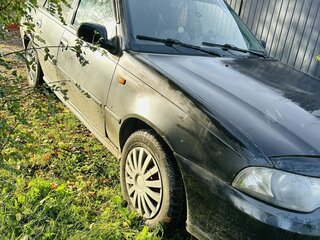 2011 Daewoo Nexia I Рестайлинг, чёрный, 100000 рублей, вид 2