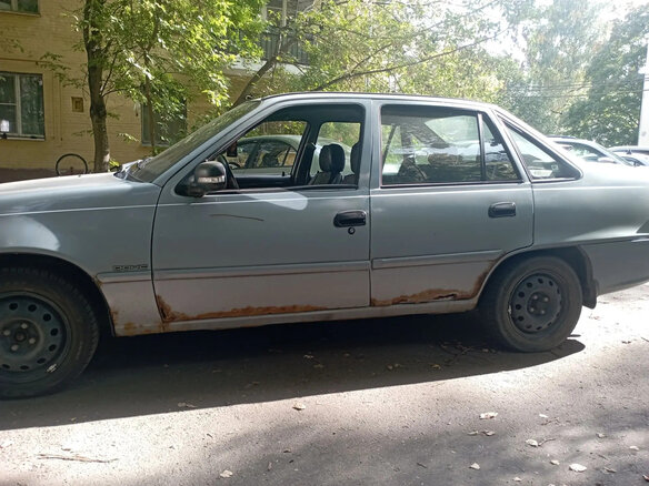 2012 Daewoo Nexia I Рестайлинг, серебристый - вид 3