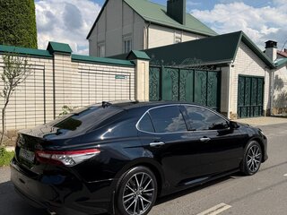 2021 Toyota Camry VIII (XV70), чёрный, 3550000 рублей, вид 4