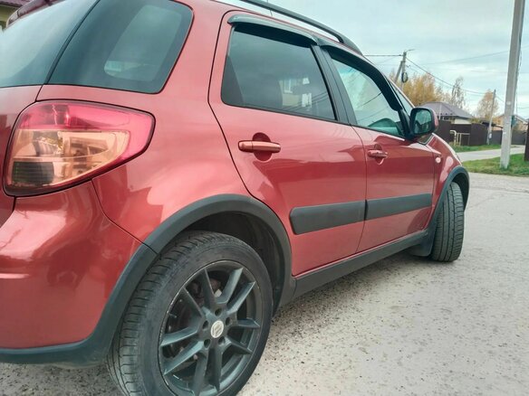 2010 Suzuki SX4 I (Classic) Рестайлинг, оранжевый, 760000 рублей - вид 7