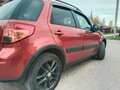 2010 Suzuki SX4 I (Classic) Рестайлинг, оранжевый, 760000 рублей - вид 7