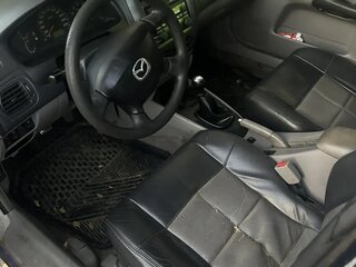 2002 Mazda 323 VI (BJ) Рестайлинг, чёрный, 140000 рублей, вид 5