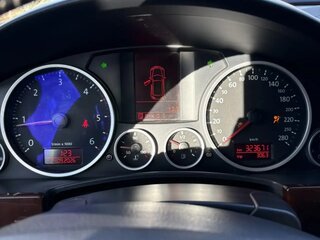 2009 Volkswagen Touareg I Рестайлинг, чёрный, 1000000 рублей, вид 5