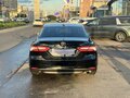 2020 Toyota Camry VIII (XV70), чёрный, 2450000 рублей - вид 5
