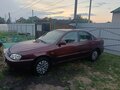 2007 Kia Spectra I Рестайлинг 2, красный, 180000 рублей - вид 6