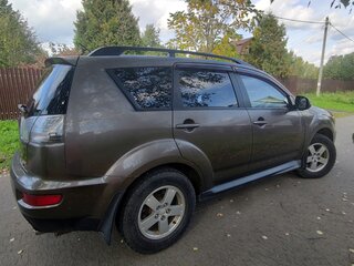2011 Mitsubishi Outlander II Рестайлинг, коричневый, 800000 рублей, вид 3