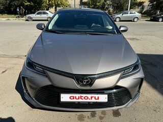 2022 Toyota Corolla XII (E210), коричневый, 1790000 рублей, вид 2