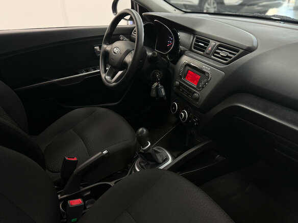 2013 Kia Rio 5-speed III, серый, 1020000 рублей - вид 7