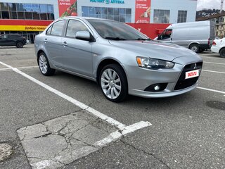 2009 Mitsubishi Lancer X, серебристый, 650000 рублей, вид 1