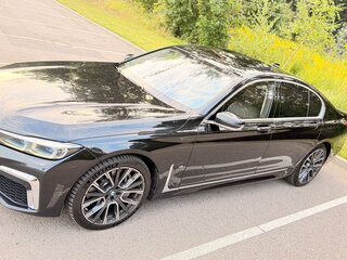 2020 BMW 7 серии 750d xDrive VI (G11/G12) Рестайлинг, чёрный, 7990000 рублей, вид 2