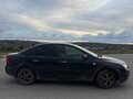 2007 Ford Focus II Рестайлинг, чёрный - вид 1