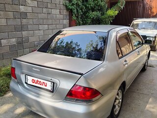 2009 Ford Focus II Рестайлинг, серебристый, 310000 рублей, вид 4