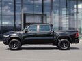 2026 Ram 1500 RHO V Рестайлинг, чёрный - вид 2