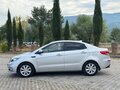 2016 Kia Rio III Рестайлинг, серебристый, 1183000 рублей - вид 9