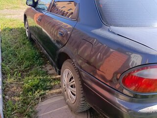 1997 Mazda Familia VII (BH), серый, 145000 рублей, вид 2