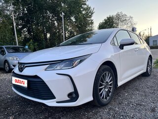 2022 Toyota Corolla Sporty XII (E210) Рестайлинг, белый, 1850000 рублей, вид 2