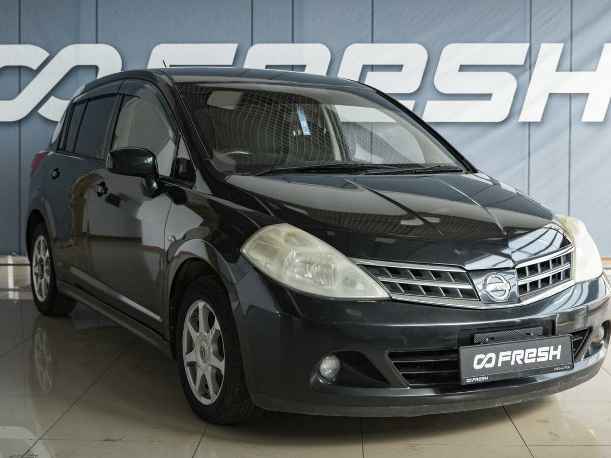 Открыть фотографии: Nissan Tiida I
