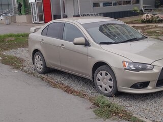 2011 Mitsubishi Lancer X Рестайлинг, бежевый, 850000 рублей, вид 2