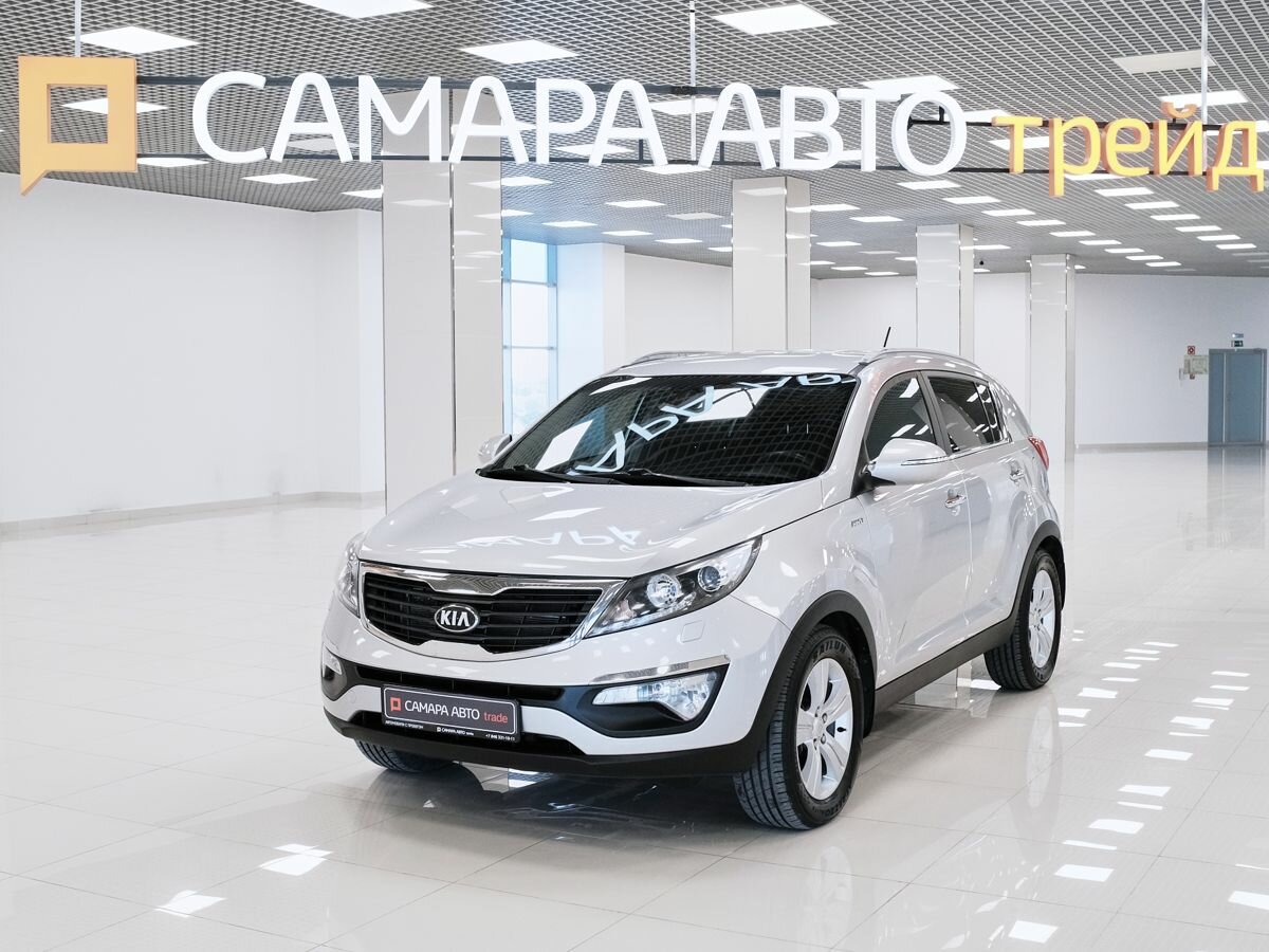Открыть фотографии: Kia Sportage III