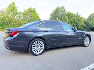 2014 BMW 7 серии 750i xDrive V (F01/F02/F04) Рестайлинг, серый, 1666666 рублей, вид 3