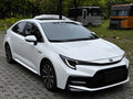2022 Toyota Corolla Sporty XII (E210) Рестайлинг, белый - вид 11