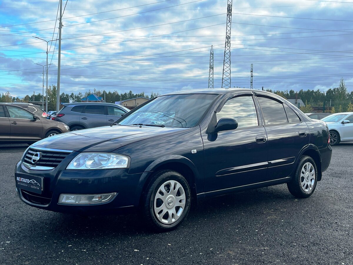 Открыть фотографии: Nissan Almera Classic I