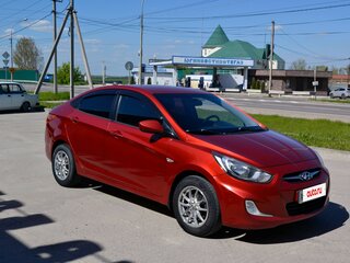 2011 Hyundai Solaris I, красный, 710000 рублей, вид 3