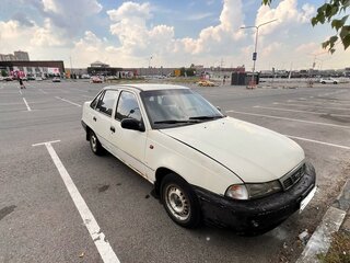 2002 Daewoo Nexia I, бежевый, 170000 рублей, вид 4