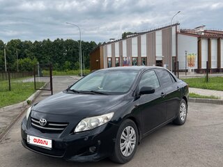 2009 Toyota Corolla X (E140, E150), чёрный, 700000 рублей, вид 1