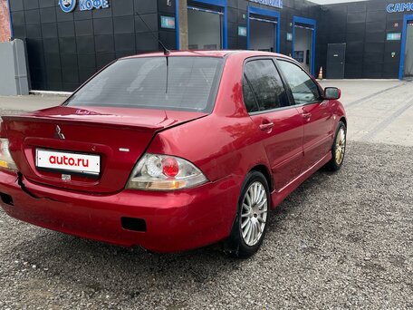 2005 Mitsubishi Lancer IX, красный, вид 5