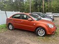 2011 Kia Rio II Рестайлинг, оранжевый, 490000 рублей - вид 5